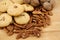 Cookies, walnuts and pecan nuts on a wooden texture table