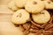 Cookies, walnuts and pecan nuts on a wooden texture table