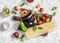 Cooking background. Raw ingredients for making pasta - spaghetti, eggplant, tomatoes, pepper, olive oil, tomato sauce and basil on