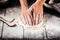 Cooking bakery hands crumple dough into  flat cake