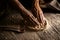 Cooking bakery hands crumple dough into  flat cake