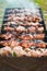 Cooking barbecue or shashlik on spit. Picnic on weekend. Outdoor