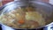 Cooking boiling vegetable soup. Slow motion