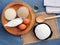 Cooking breaded farmers cheese dumplings with ingredients on a rustic table