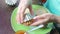 Cooking cake. Woman pulls out of the baking dish ready-made bases for cakes.