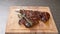 Cooking concept. Grilled marinated beef flank steak on wooden board