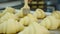 Cooking croissants. Puff pastry, croissants, puffs. Food industry, confectionery, bakery. Knead, roll out the dough at a