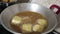 Cooking deep fried tempeh, Indonesian traditional meal, tempe goreng or gorengan