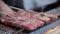 Cooking and delicious food concept. Closed up fresh and raw beef or pork meat was grilled barbecue steak in the kitchen