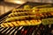 Cooking delicious fresh zucchini on grilling grate in oven, closeup