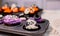 Cooking delicious homemade cake and decorate cupcake for Halloween festive. Preparing and mixing ingredients for sweet food