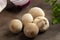 Cooking edible puffball mushrooms. Several whole mushrooms on a cutting board