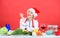 Cooking for family. Healthy christmas holiday recipes. Easy ideas for christmas party. Woman chef santa hat cooking at