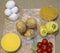 Cooking fast food dishes: eggs, potatoes, bulgur, cherry tomatoes, bay leaf, corn grits, sweet pepper