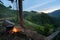 Cooking fire under house on stilts at dawn in terrace rice field in Mu Cang Chai, Vietnam