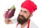 Cooking the flavors of nature. Bearded man enjoy cooking natural food. Chef cook prepare eggplant for cooking. Cooking