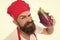 Cooking the flavors of nature. Bearded man enjoy cooking natural food. Chef cook prepare eggplant for cooking. Cooking