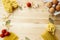 Cooking food background with free space for text. Composition with pasta, tomato, eggs, garlic, bay leaf over the wood background