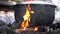 Cooking food in boiler with wooden fire