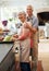 Cooking, food and portrait of old couple in kitchen for salad, love and nutrition. Happy, smile and retirement with