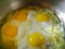 Cooking homemade rustic simple fried eggs