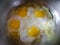 Cooking homemade rustic simple fried eggs