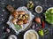 Cooking ingredients. Mushrooms,rice, vegetables and spices. On a dark background, top view.