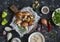 Cooking ingredients. Mushrooms,rice, vegetables and spices. On a dark background, top view.