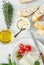 Cooking Italian bruschetta, baguette, olive oil, cherry tomatoes