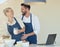 These cooking lessons are a bonding experience. a young couple cooking together at home.