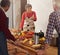 Cooking with love provides food for the soul. a woman instructing a cooking class.