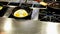 Cooking omelettes and fried eggs. Breakfast buffet in restaurant