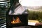 Cooking on an outdoor fireplace Barbecue in the mountains