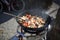 Cooking outdoors on a camping kitchen