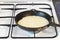 Cooking pancake on frying pan