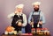 Cooking with passion. Healthy food cooking. mature senior bearded men in kitchen. Halloween recipe. cereals and