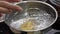 Cooking pasta. Cooking togliatelli in a saucepan of boiling water.