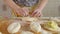 Cooking pies. Woman glues dough with stuffing inside