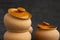 Cooking pots on a dark background