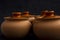 Cooking pots on a dark background