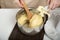 Cooking process profiteroles, puffs, eclaires. Cook prepares the dough