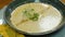 Cooking process and serving mushroom cream soup in a bowl. Eating healthy vegetarian dinner.