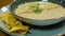 Cooking process and serving mushroom cream soup in a bowl. Eating healthy vegetarian dinner.