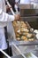 Cooking pumpkin fritters in Valencia, spain during fallas fest