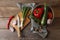 Cooking ratatouille. Vegetables, rosemary and knife on wooden table, flat lay