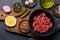 Cooking savory beef tartare and brown bread toasts