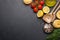 Cooking scene: Cherry tomatoes, pasta, spices on table