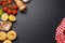 Cooking scene: Cherry tomatoes, pasta, spices on table