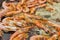 Cooking shrimps in boiling oil closeup