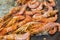 Cooking shrimps in boiling oil closeup